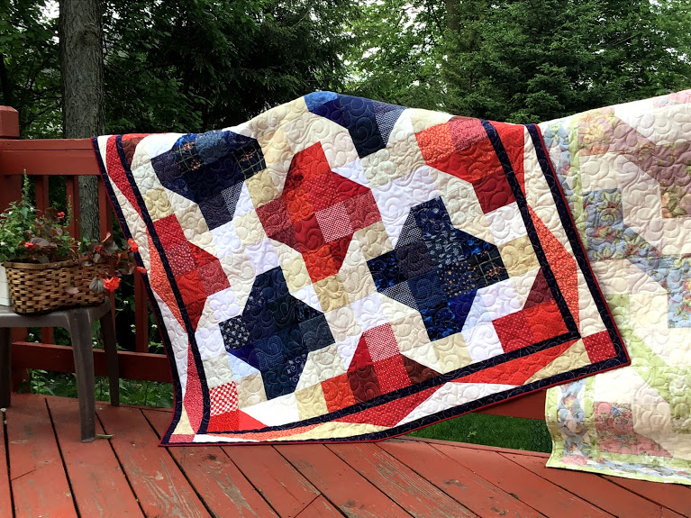 "Spinning Attic Windows" is a Free Mystery Quilt Pattern designed by Lori Dickman from Quilting with Lori!
